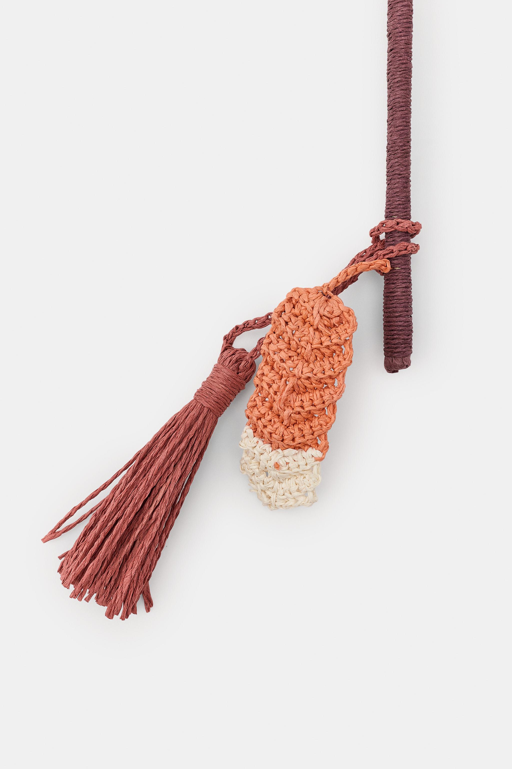 BRAIDED TASSEL FAN